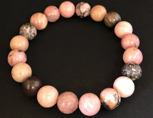 Who Should Wear Rhodonite? The Ultimate Guide to Benefits & Who It's For