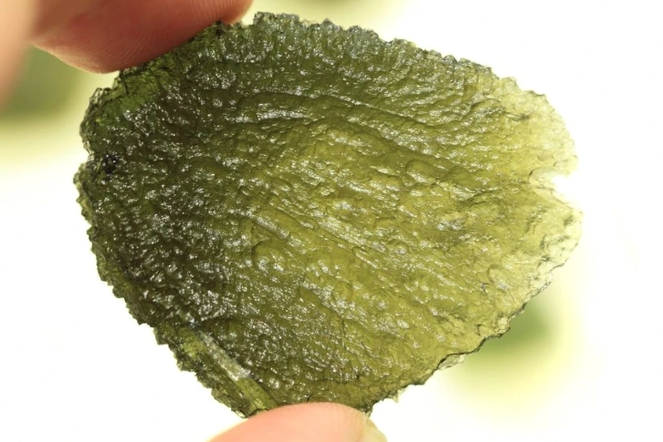 Moldavite Crystal Benefits: Spiritual Transformation and Healing Guide